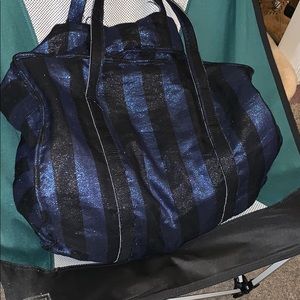Spacious black and blue sparkling travel bag